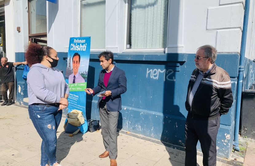 Rehman with constituents at the street surgery