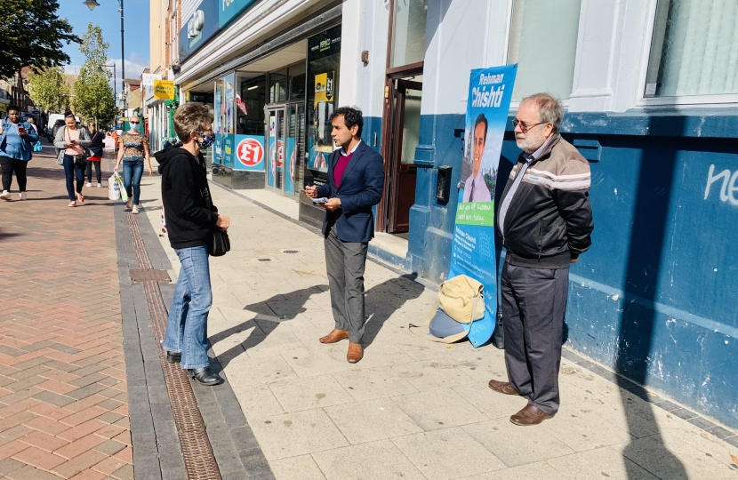 Rehman with constituents at the street surgery