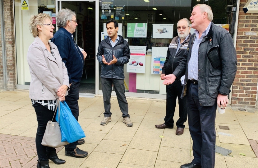 Rehman speaking with constituents