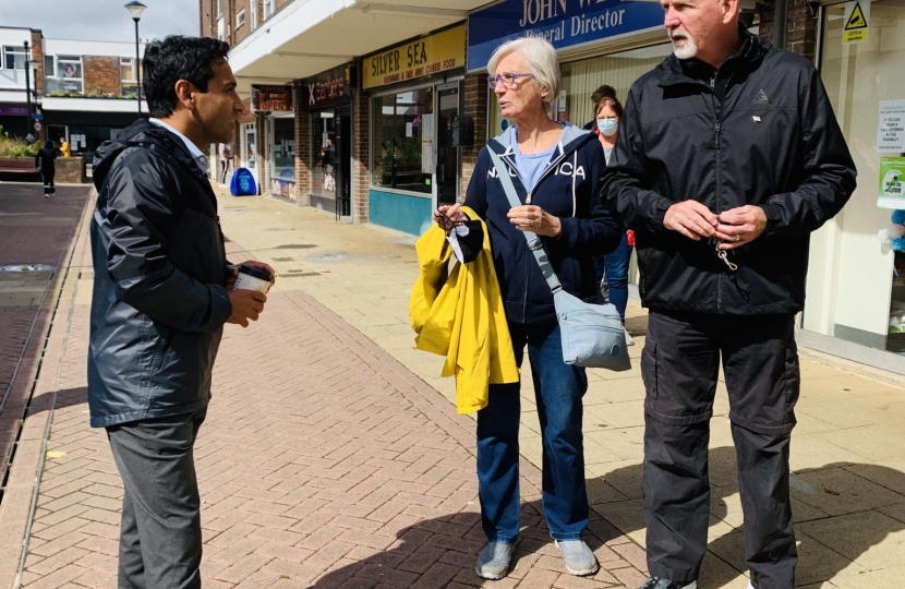 Rehman speaking with constituents