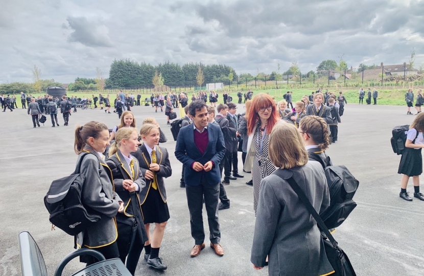 Rehman with pupils and Principal Alex