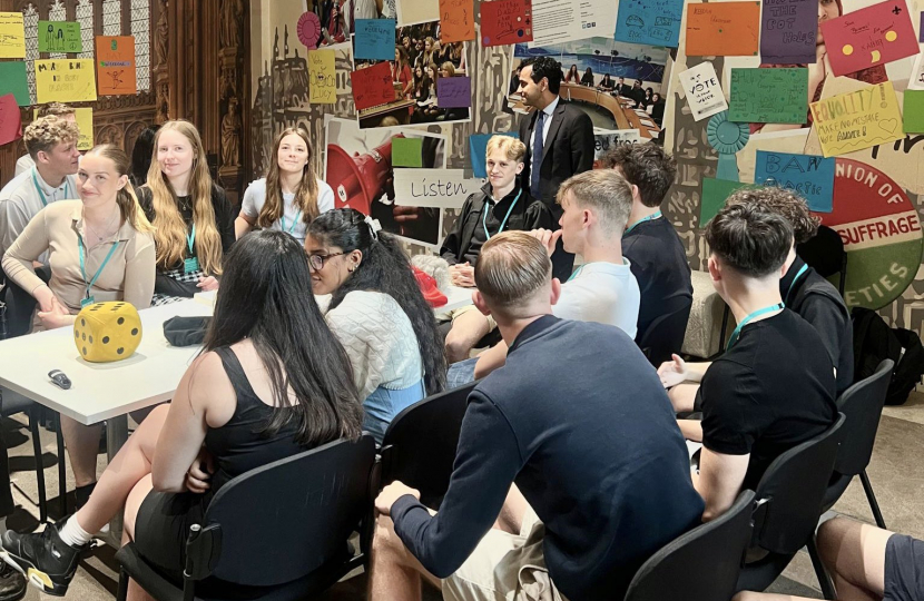 Rehman talking to students from the Howard school