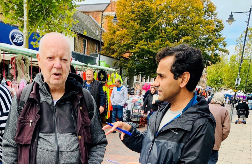 Rehman with local residents