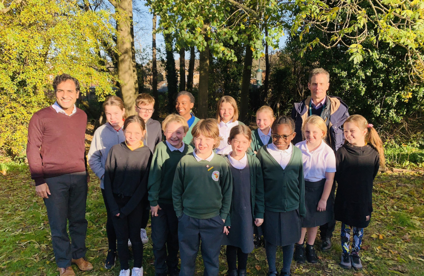 Rehman with Hempstead Junior pupils and staff