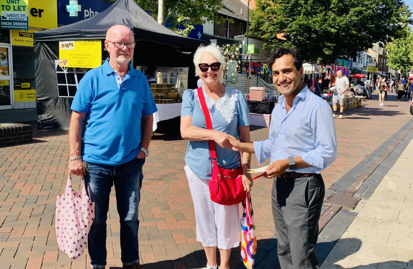 Rehman with local residents