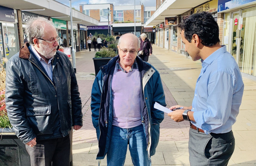 Rehman with local residents