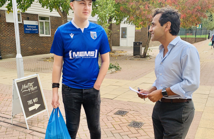 Rehman with local residents