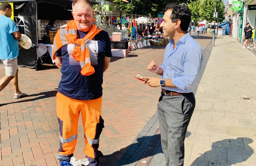 Rehman with local residents