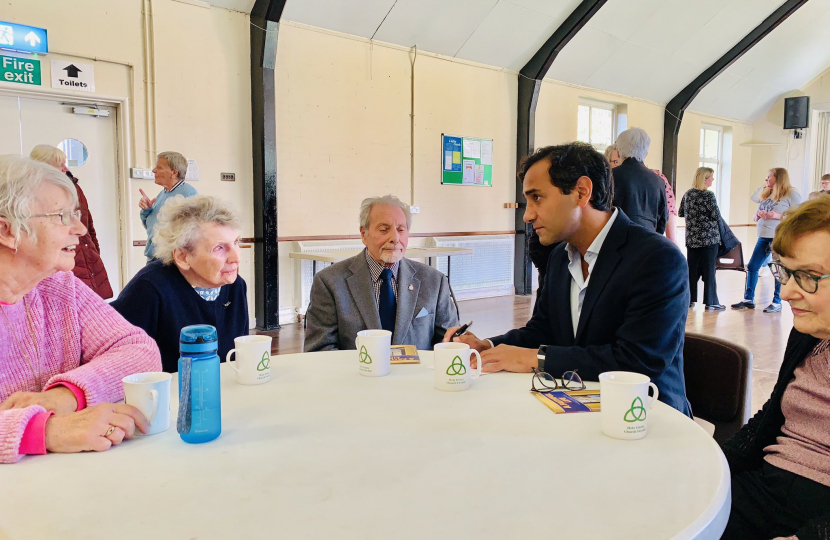 Rehman with local residents