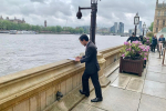 Rehman next to the Thames