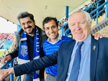 Rehman watches Gillingham FC play against Rotherham with former MP Kevin Barron