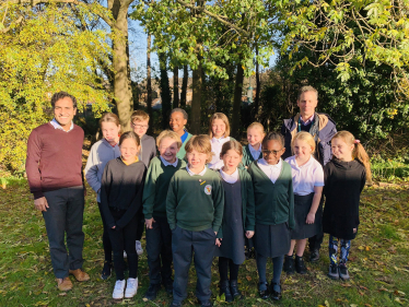 Rehman with Hempstead Junior pupils and staff