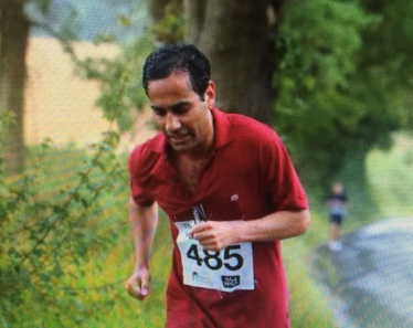 Picture of Rehman running a previous race