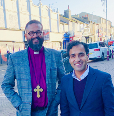 Rehman with Reverend Saju