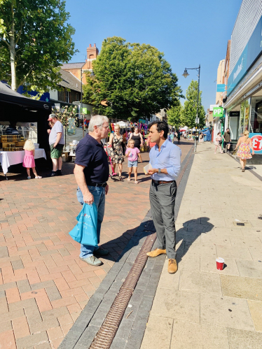 Rehman with local residents